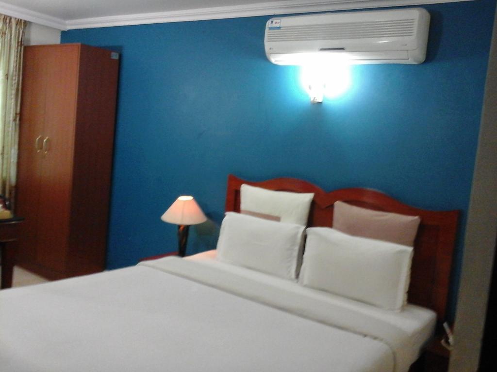 Hotel Pigeon International Bangalore Habitación foto